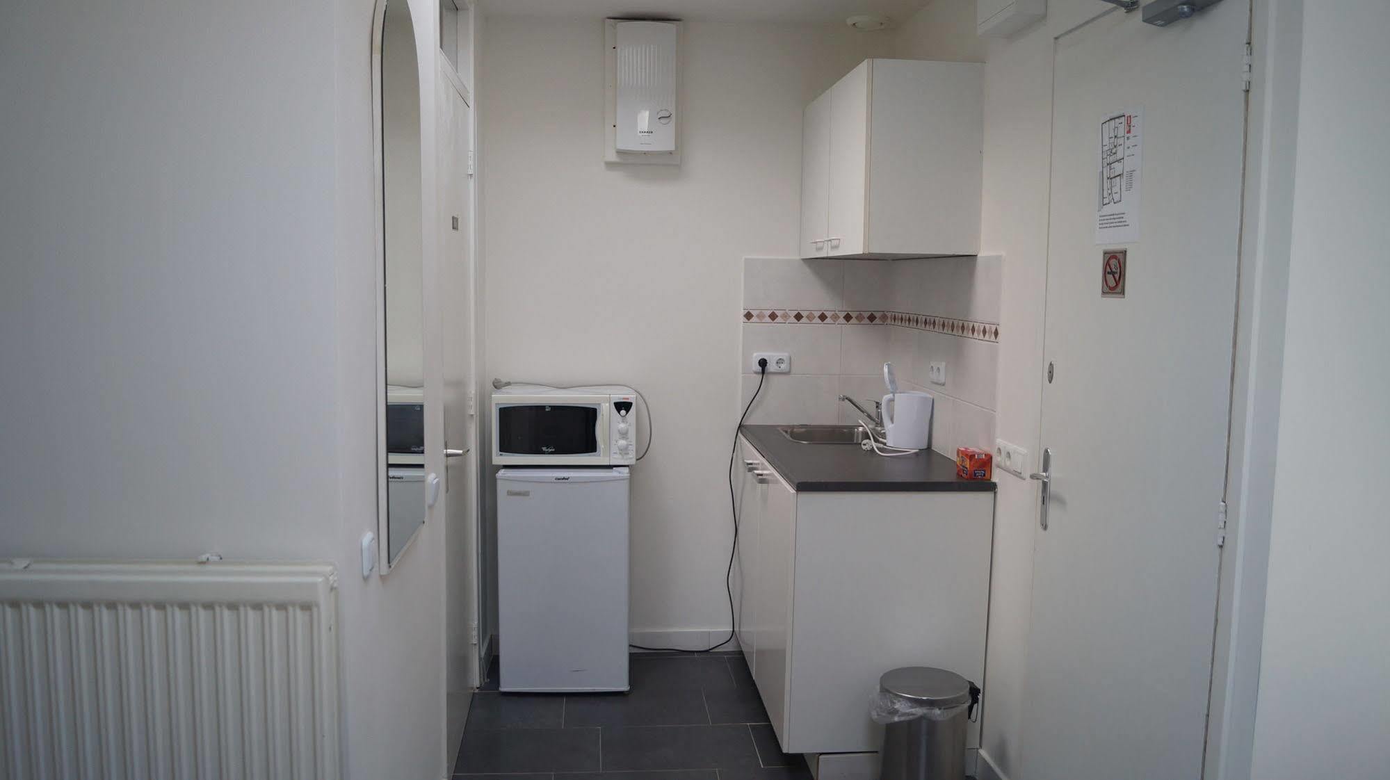 Budget Hotel De Witte Hoeck Amsterdam วอร์เมอร์เวียร์ ภายนอก รูปภาพ