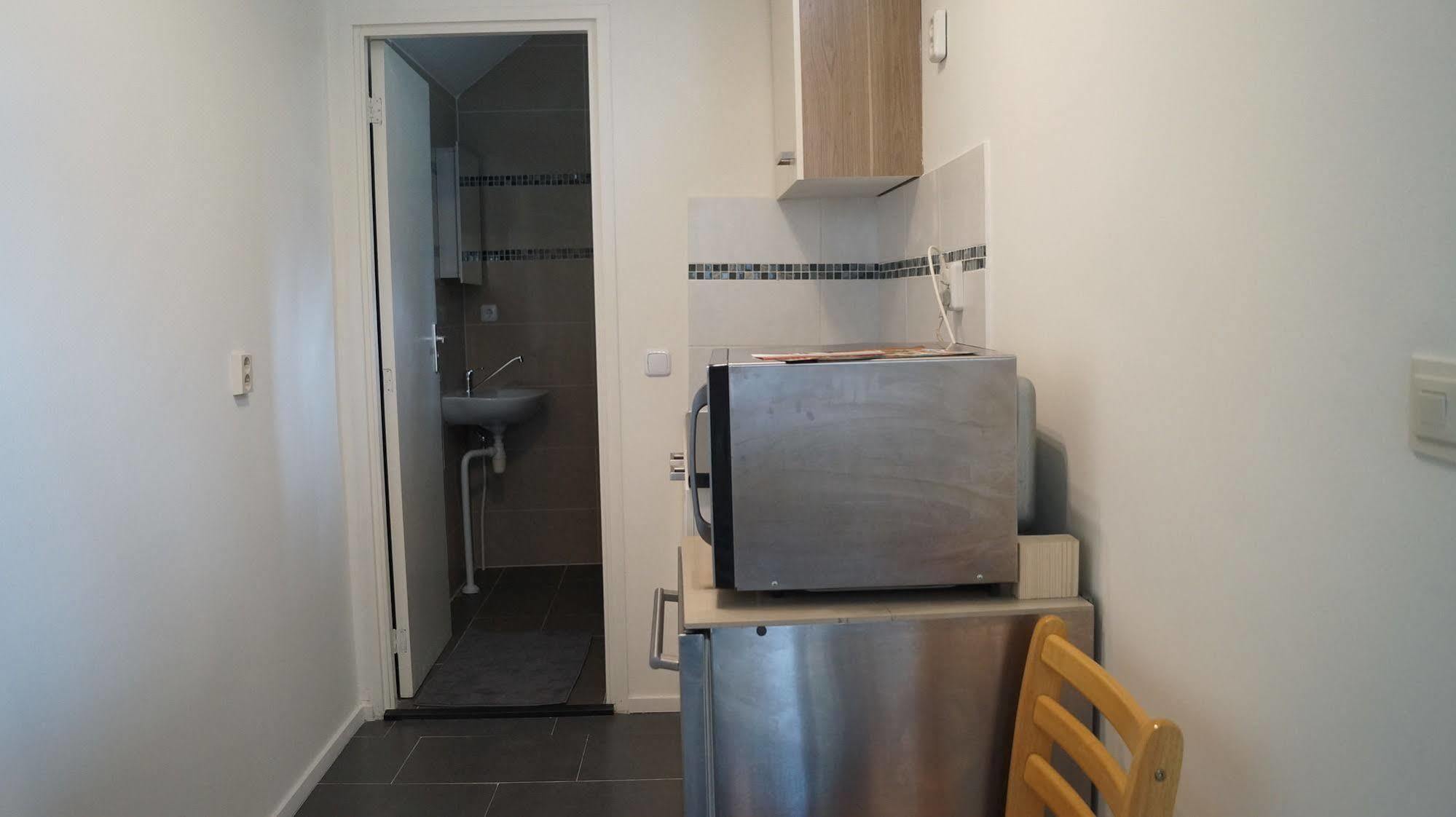 Budget Hotel De Witte Hoeck Amsterdam วอร์เมอร์เวียร์ ภายนอก รูปภาพ